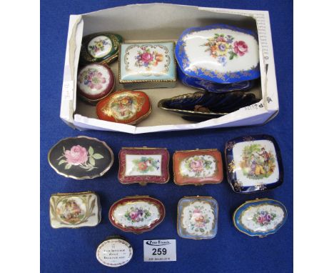 Group of enamel and porcelain patch and other trinket boxes to include: late 18th Century Bilstone enamel oval patch box read