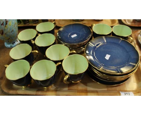 34 piece Carlton ware part tea service on a blue gilt and green ground.(B.P. 24% incl. VAT)