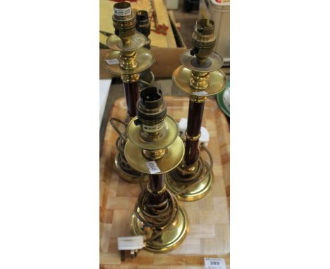 Pair of modern brass table lamps together with another similar, together with another silvered finish table lamp. (4)(B.P. 24