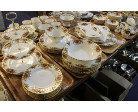 Four trays of Royal Albert bone china 'Old Country Roses' items to include: three section cake stand; various plates; bowls; 