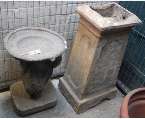 Garden composite bird feeder, the pedestal modelled as a cherub with wings, together with a composite chimney stack planter. 