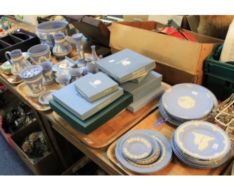 Five trays of mainly blue and white Jasper ware items to include: collectors plates, many in original boxes; urn shaped Campa