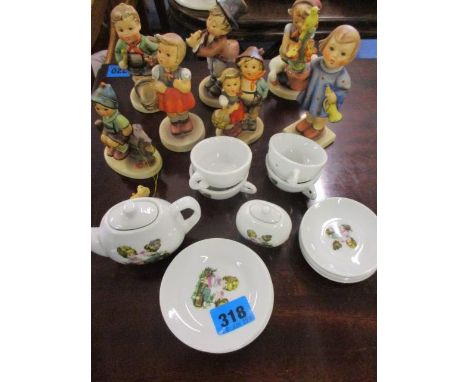 A mid 20th century child's china teaset, together with Goebel figures A/F 