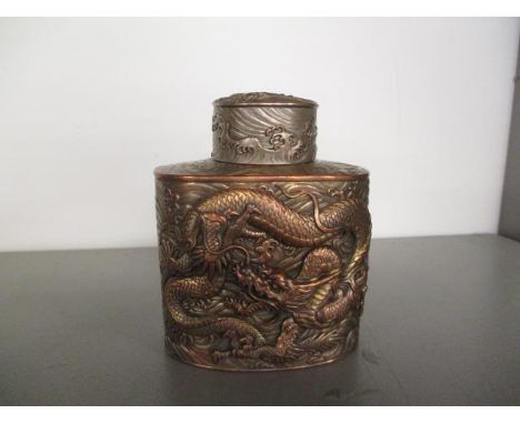 A Japanese, silver plate on copper tea caddy, 4 5." h 