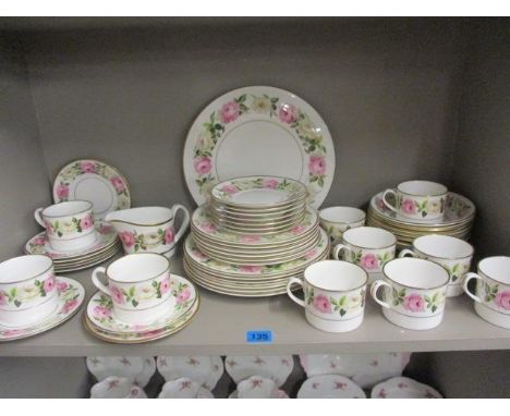 A Royal Worcester Royal Garden pattern teaset decorated with pink and white roses 