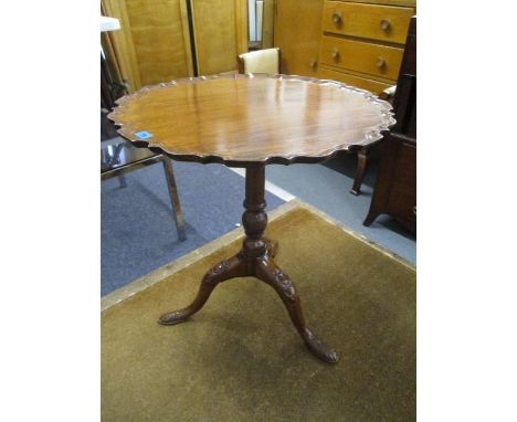 An early 19th century mahogany, pie crust occasional table, with tripod cabriole legs 