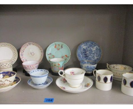 A collection of early 19th century and later tea bowls, saucers and coffee cans  to include a Caughley tea bowl with saucer 