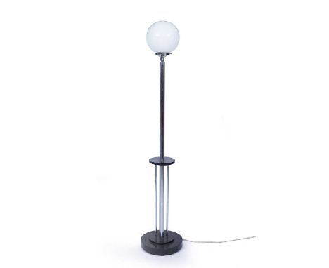 Bauhaus StyleGerman Standard lamp, circa 1920the circular glass shade above tubular metal supports and black painted base179c