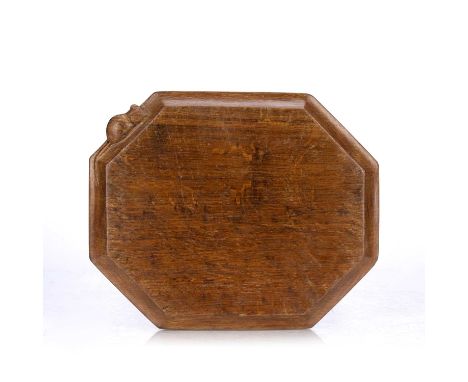 Robert Thompson of Kilburn (1876-1955)Mouseman breadboard, circa 1950oakcarved mouse signature30 x 25cm.