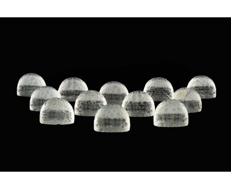 René Lalique (1860-1945)A set of twelve 'Panier de fruits' menu holdersfrosted glasseach signed 'R Lalique'4.5cm high, 5.5cm 