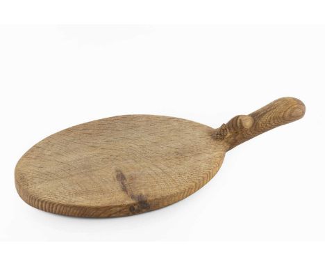 Robert Thompson of Kilburn (1876-1955) Mouseman cheese board oak carved mouse signature to handle38cm across.