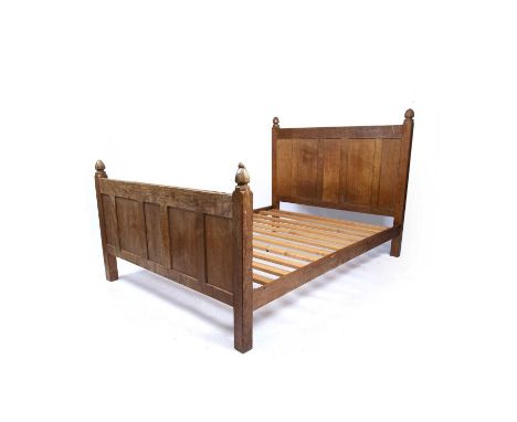 Robert Thompson of Kilburn (1876-1955)Mouseman double bed, circa 1940oak, the ends panelled and lightly adzedcarved mouse sig