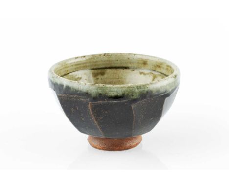 Richard Batterham (1936-2021)Footed bowlthe body with tenmoku glaze and cut sides, the interior and rim with green ash glaze1