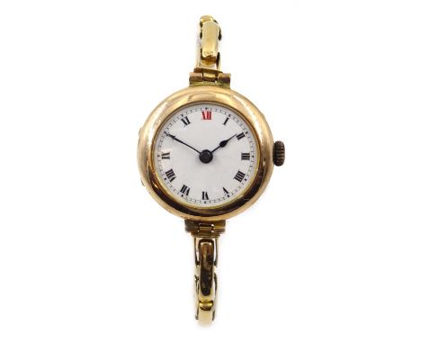 Early 20th century 9ct gold enamel faced wristwatch on expanding 9ct gold bracelet Condition Report 17.4gm grossClick here fo