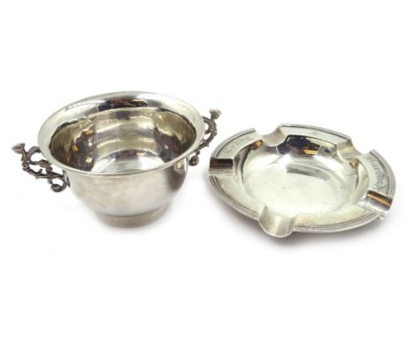Silver twin handled bowl by Thomas Bradbury & Sons Ltd Sheffield 1902, 10cm and a silver ashtray by Walker & Hall Sheffield 1