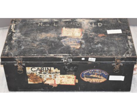 A vintage metal steamer trunk with labels and stencilling for Cunard White Star Line and 'Major L W Donald Intelligence Corps