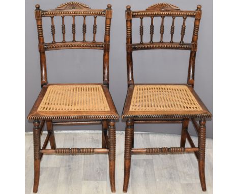 Pair of Regency bobbin decorated chairs with cane seats