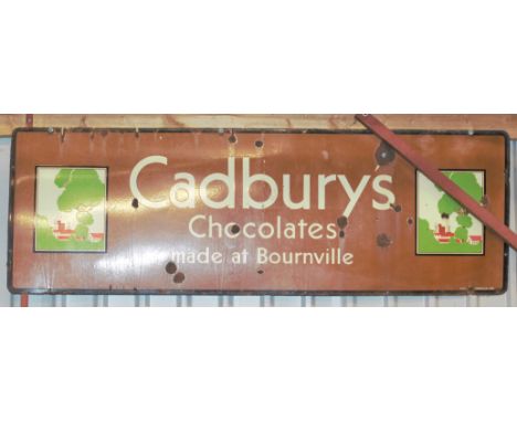 Vintage enamel advertising sign 'Cadbury's Chocolates made at Bournville', 61 x 183cmPLEASE NOTE this lot is located at and w