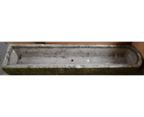 A natural stone trough, W214 x D44 x H20cm