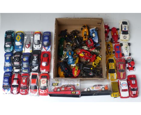 Over fifty Rally and Formula racing Scalextric cars and shells, examples from 1970's, 80's &amp; 90's, models include Team Lo