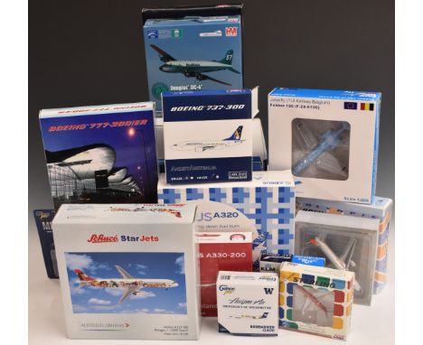 Twenty diecast model aircraft, various liveries including Air Greenland, Egypt Air, Singapore Airlines and a large scale Cath