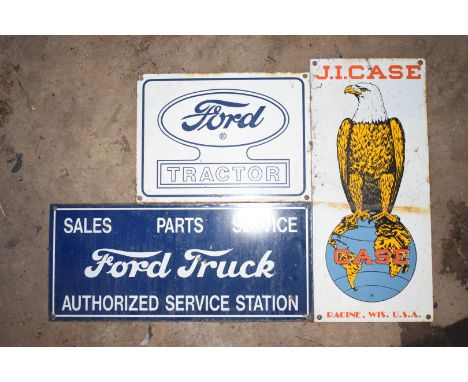 Three enamel advertising signs comprising Ford Tractor, J I Case & Ford Truck, largest 20.5 x 46cmPLEASE NOTE this lot is loc