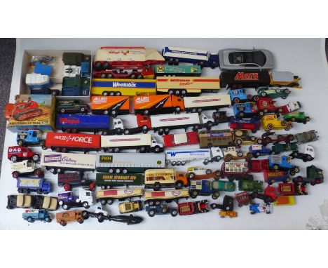 A collection of Corgi, Matchbox and other diecast model vehicles including Kellogg's Grain Transporter, Land Rover 109 WB 'Ra