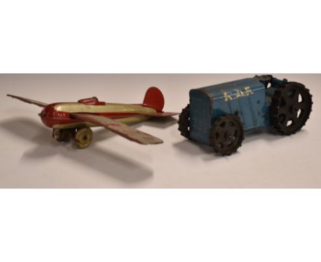 Mettoy or similar tinplate clockwork model aeroplane marked G-E OBT together with a Tri-ang clockwork pressed steel RAF tract