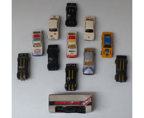 Thirteen 1970's &amp; 80's Ford Scalextric cars, models include C052 Escort Mexico, L5844 Escort XR3i, L5379 Capri 3.0 and C0