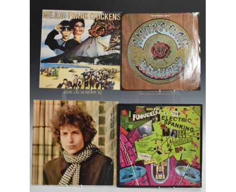 Approximately 80 albums including Dr Feelgood, Bob Dylan, Steve Earle, Dave Edmunds, Eurythmics, Bryan Ferry, Rory Gallagher,