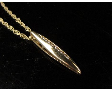 A gold pendant set with a row of vertical diamonds, stamped 9k, hung on a 9ct gold chain, 45cm long, 2.7g 