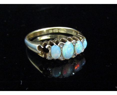 An 18ct gold opal and old cut diamond ring, one opal missing. Size P, 3.7g 