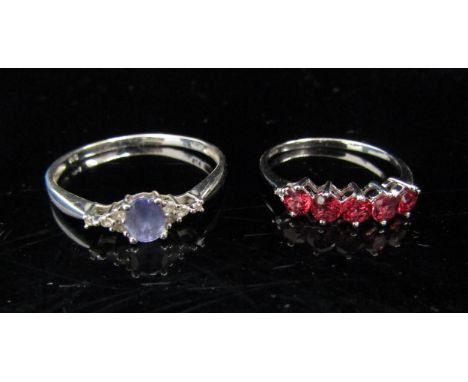 A 9ct white gold five stone Tanzanian ruby and diamond ring. Size N/O, 1.3g and a 9ct white gold amethyst and diamond ring. S