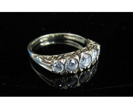 A 9ct gold ring set with five cubic zirconias. Size O, 2.7g 