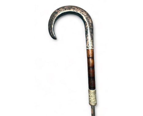 Ebonised sword Stick with Silver crook handle, Hallmarks and makers name unclear but looks to be around 1907. Length of stick