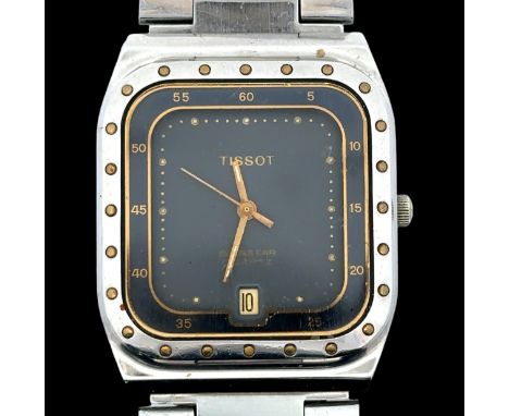 A Tissot Seastar watch with quartz movement. Square dial with dot hour markers, date display and stainless steel case and bra