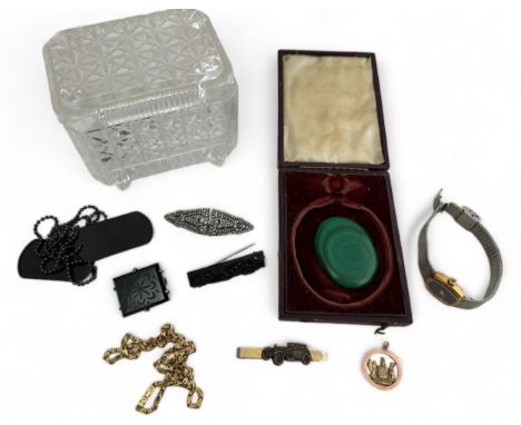 A collection of jewellery items, a malachite cabochon and a glass trinket box. Includes an 'Advance New Zealand' fob pendant 