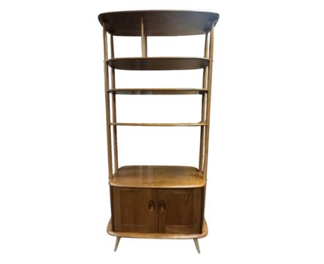 A 1960s Ercol light elm 'Giraffe' room divider, model No.363, having four open upper shelves over twin lower cupboard section