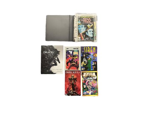 Star Trek The Motion Picture Comics in folder. Star Trek #1,2,5,9. Plus other Star Trek comics, bagged and boarded in A4 ring