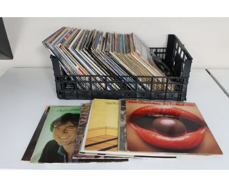 A crate of vinyl LP records : Roy Orbison, Boney M, Buddy Holly etc 