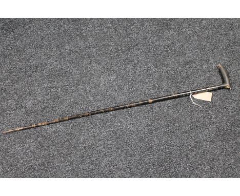 A bone handled whistling walking stick 