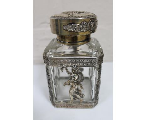 A presentation decanter with highly ornate silver mounts, circa 1900 CONDITION REPORT: Noticeable crack to body of decanter. 
