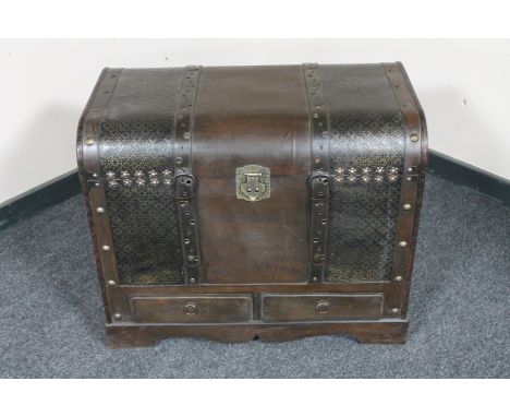 A contemporary leather bound travel trunk 