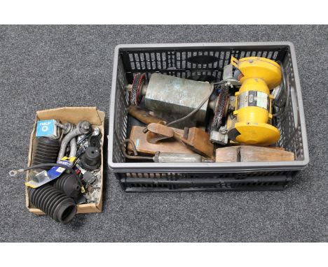 A crate of bench grinder, vintage wood working planes, box of Peugeot car badge and car parts 