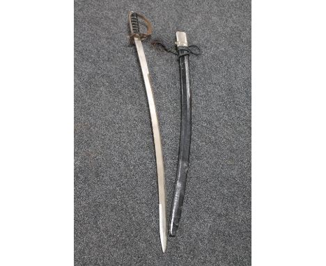 An Indian sword in scabbard 