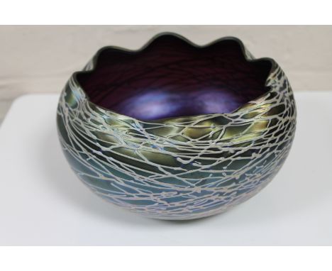 An iridescent Austrian amethyst glass bowl in the manner of Loetz, width 20cm CONDITION REPORT: Crack running through body. 