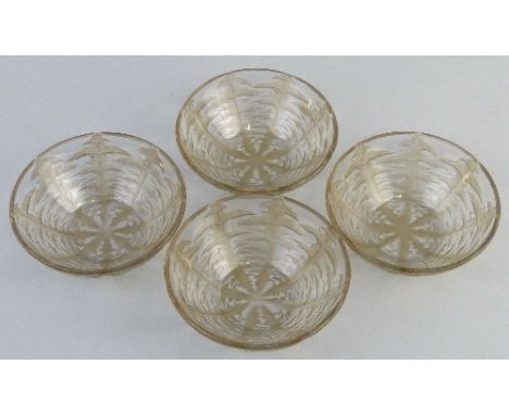 A set of four Lalique Pis-En-Lit clear glass bowls, of tapering circular form, each moulded R Lalique and etched France No. 3