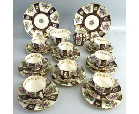 An early 20th century Crown Staffordshire tea-set, comprising two sandwich plates, eight of each cups, saucers and side plate