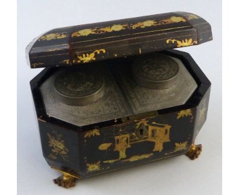 A 19th century lacquered tea caddy, of octagonal form with chinoiserie style gilding of figures and flowers the domed hinged 