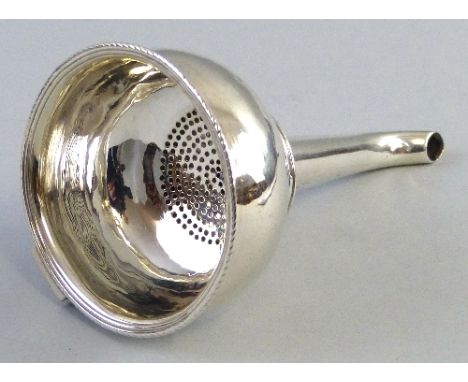 A George III wine funnel, with bulbous bowl and ring design to the tapering stem, London 1768, 2.4ozs